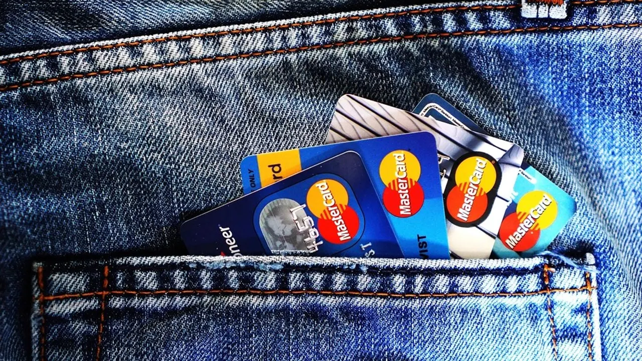 Assorted prepaid and gift cards on a table